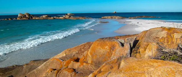 Cobler Rocks Trail and Bay of Fires; fiery granite rocks on white beach