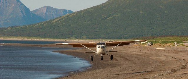 Plane approaching Hallo Bay for bears viewing in Katmai Alaska