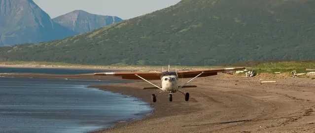 Plane approaching Hallo Bay for bears viewing in Katmai Alaska