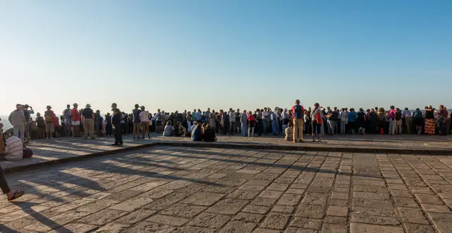 Crowds on the west-terrace at Mont-Saint-Michel watching the spring tide