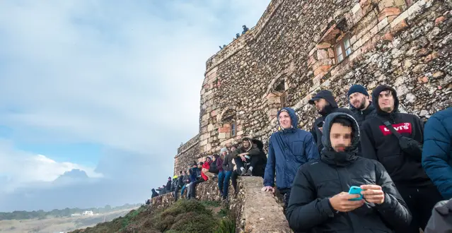 Many people watching the Giant Wave Competition in January 2019