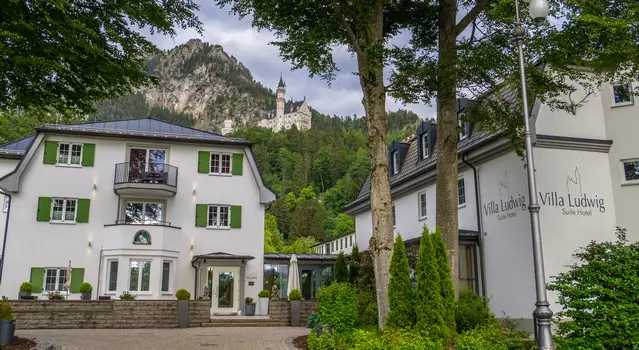 Hotel Villa Ludwig and Neuschwanstein in the back