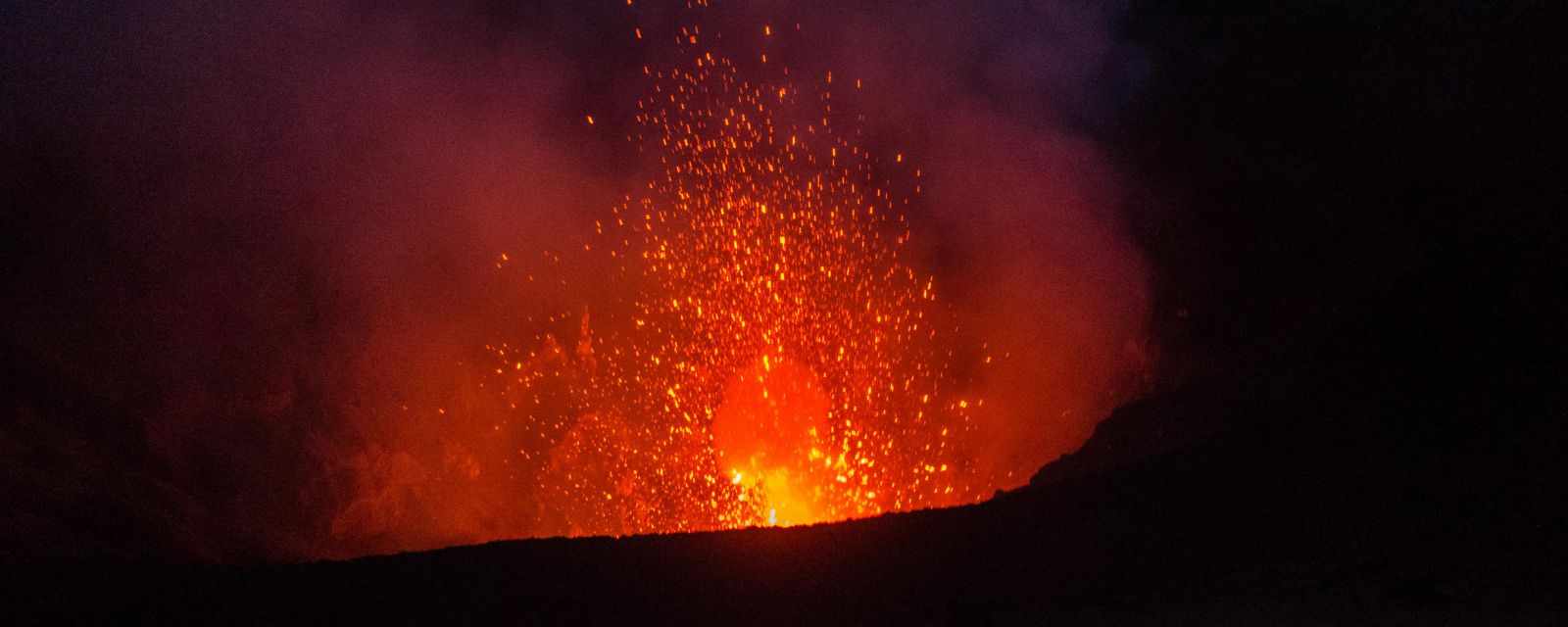 Fiery explosion of Yasur in the evening