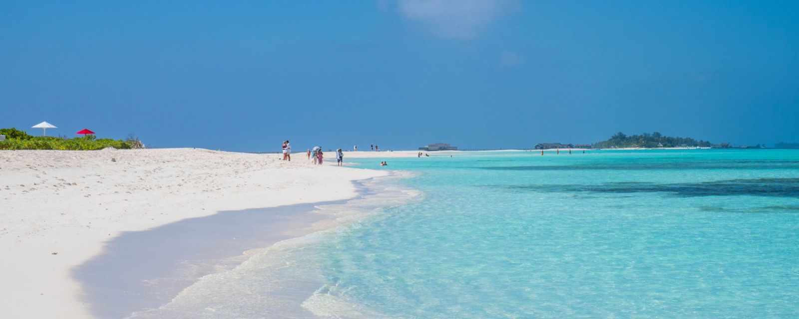 Beach and Sandbank and crystal clear sea from Dhigurah in the Maldives
