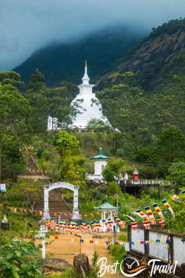 A temple and plenty of Buddhist flags along the track.