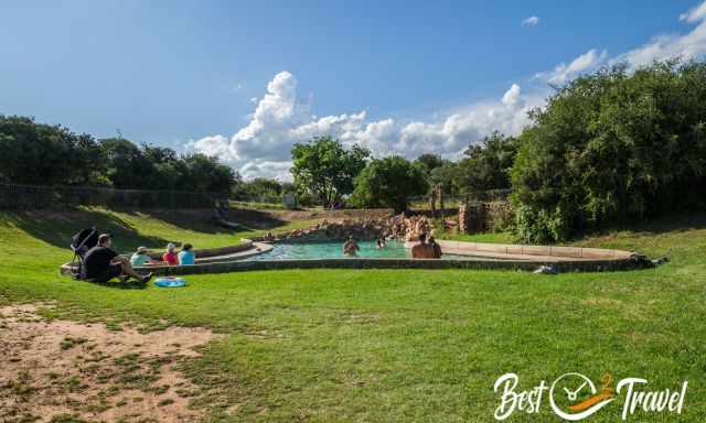 Pool with guests in Addo on a sunny day in summer.