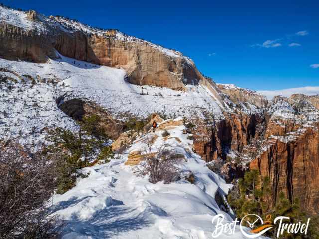 The top of Angels Landing covered in snow.