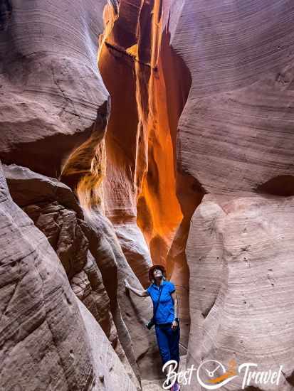A visitor in a slot canyon.