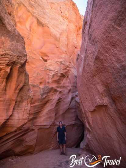 A hiker at the slot canyon entrance.