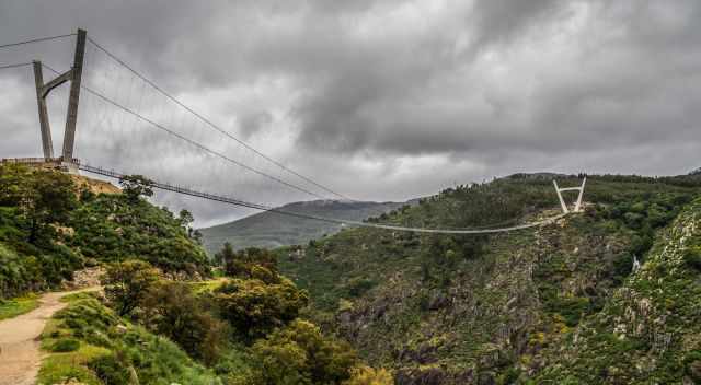 Arouca bridge with dark and rainy sky