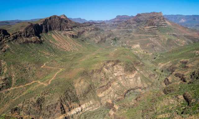 The view down to the canyon and the hiking trail leading through it