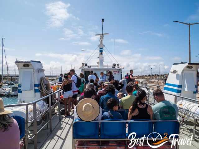 The upper deck of ferry boat totally full