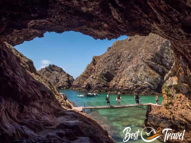 View out of a cave to the harbour and a bridge on Berlenga Grande