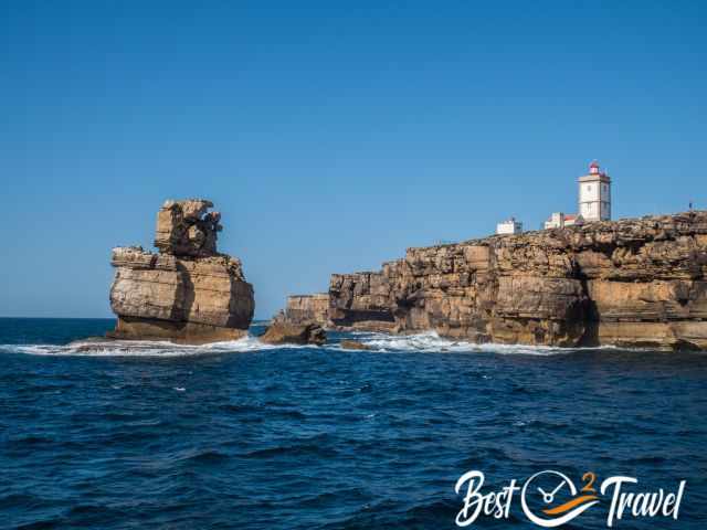 Farol do Cabo Carvoeiro and the rock formation from the boat