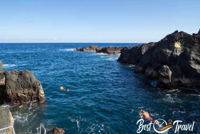 Two snorklers at Biscoitos