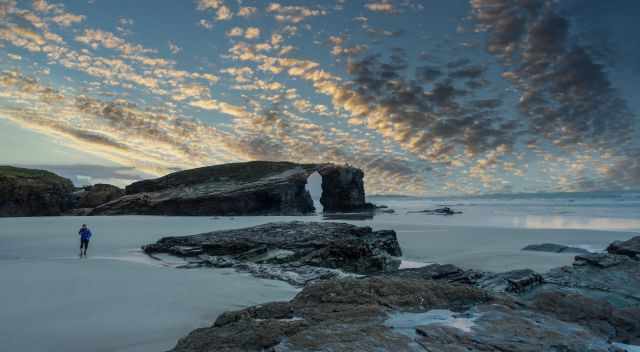 The first arch and just one visitor on Cathedral Beach