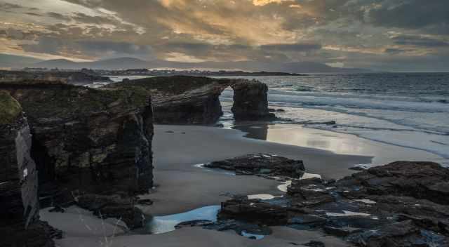 Cathedral Beach from the clifftop at low tide and sunset