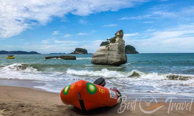 A tour boat on the beach of Cathedral Cove