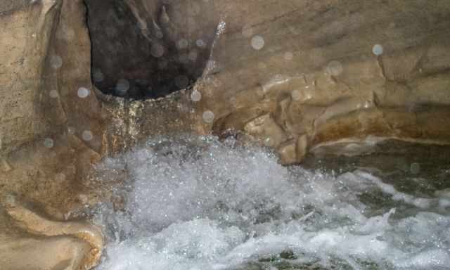 One waterfall inside the cave stream 