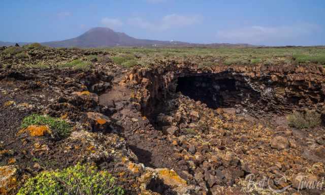 A collapsed part of the lava tube giving access to the cave