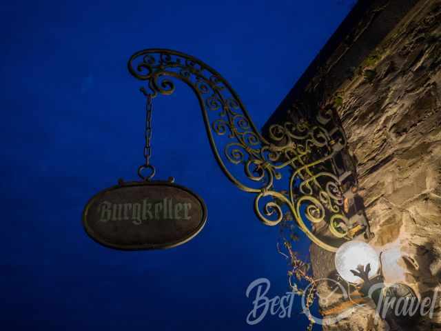 A sign in the courtyard for the Burgkeller - the castle cellar.