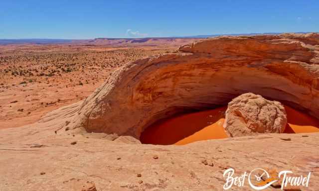 A tiny person to the left in comparison to the vast Cosmic Ashtray