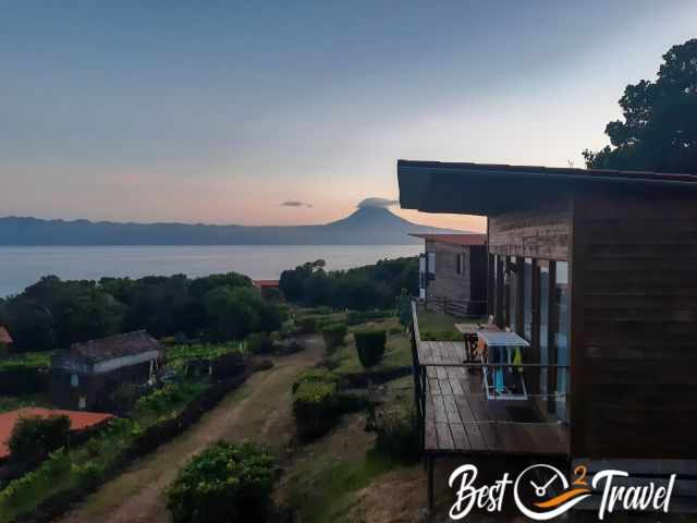 Cottages in Urzelina with a sunset view to Pico Mountain.