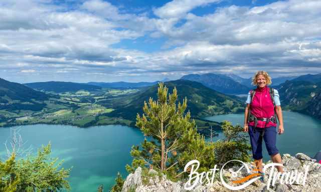 A climber woman on the summit of Drachenwand in Austria