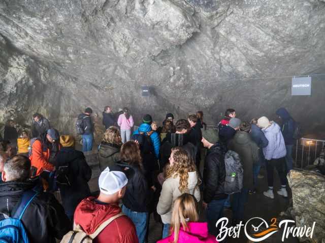 People waiting in two lines for access to the ice cave.
