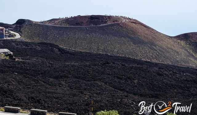 A bunch of people on the crater rim