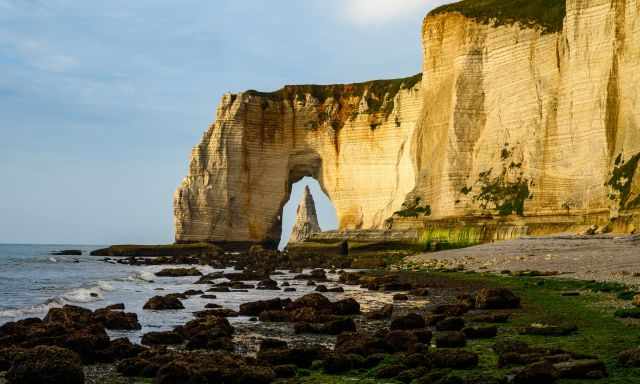 One of the arches - view from the rocky beach at low tide