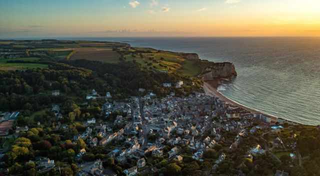 Drone shot from Etretat and the White Cliffs at sunset