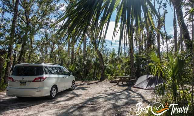 Our tent site and car at Collier Seminole State Park 