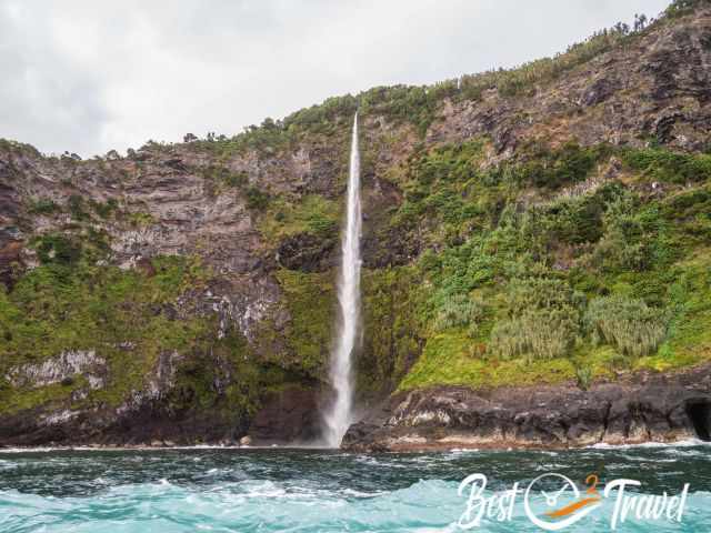 A waterfall plunges into the sea at Flores.