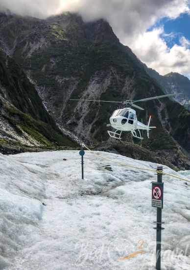 A helicopter landing on Franz Josef Glacier