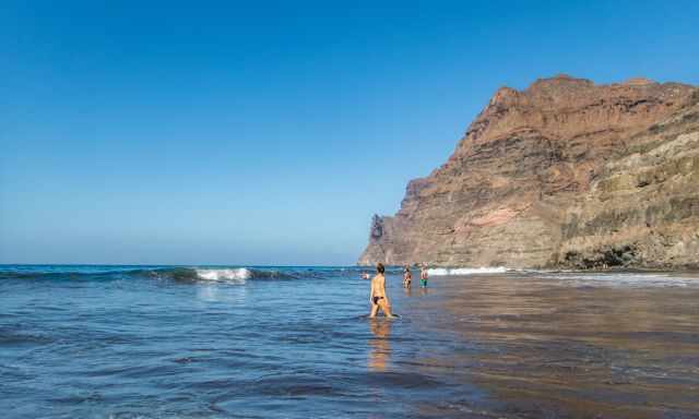 Picture taken in the water view to other visitors having fun in the waves.