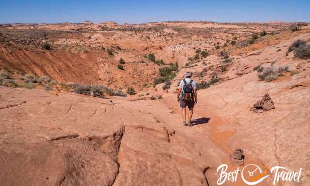 A hiker on the Peek-A-Boo and Spooky trail in the desert.