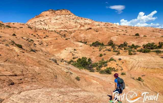 A hiker in the rugged landscape of Grand Staircase Escalante