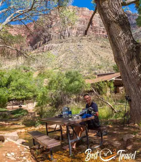 A table and bench in the creek for resting