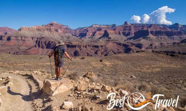 A hiker looks down to the Tipoff