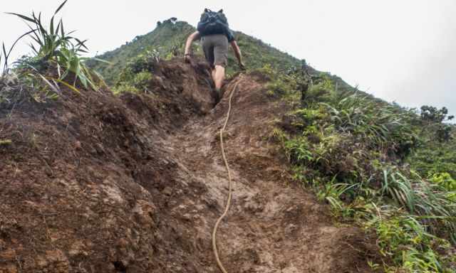 Steep muddy climb to the Haiku Stairs