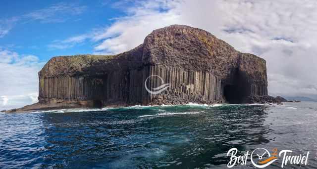 Fingal's Cave on a sunny day with a calm sea