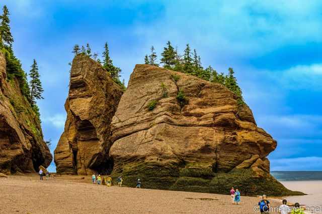 Visitors exploring Hopewell Rocks at Low Tide