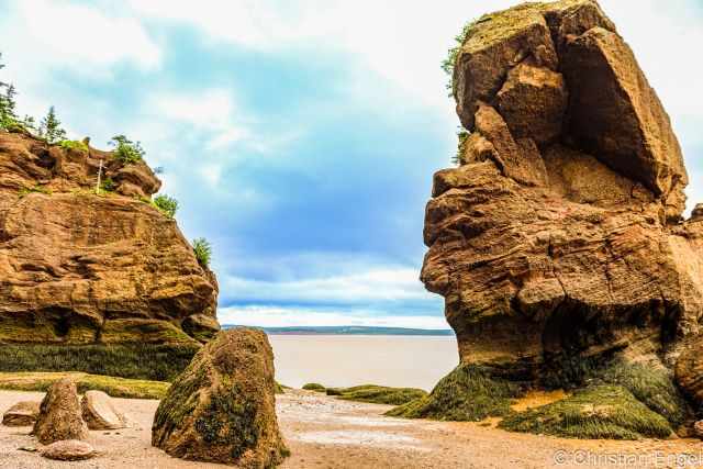 You can see lose rocks still stuck to the sea stack.