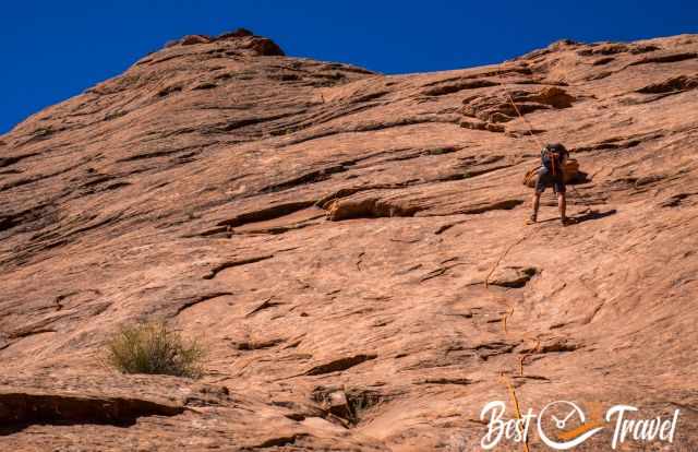 The steep wall and climb on slick rock