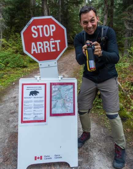 A man with bear spray in his hand