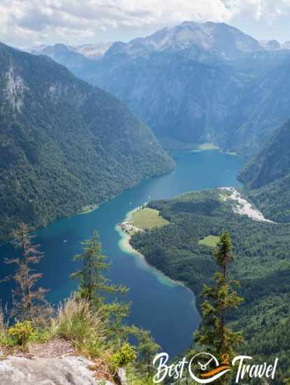 Fjord‑like view from the Archenkanzel viewpoint overlooking the deep blue Königssee and the steep alpine walls.