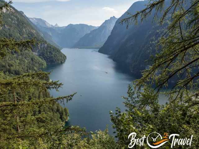 View from the Rabenwand viewpoint overlooking the deep blue Königssee surrounded by steep forested mountains.