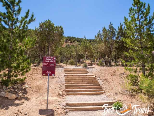 A staircase at the trailhead and parking