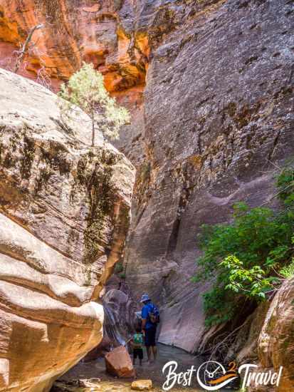 A father and his young son in the Kanarra Creek 